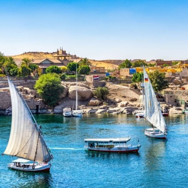 Sunlight over boats on Nile in Aswan, Egypt