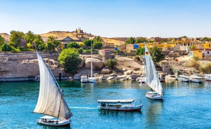 Sunlight over boats on Nile in Aswan, Egypt