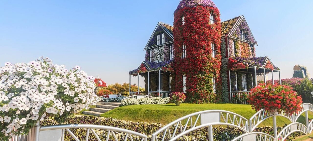 Dubai-House covered in flowers at Dubai's Miracle Garden, largest natural flower garden in the world