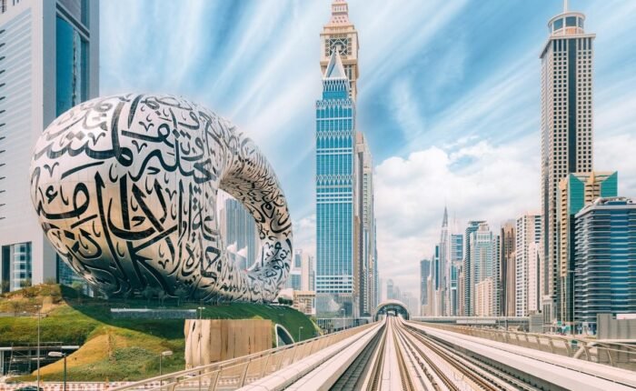 Dubai-Metro Railway Among Among Glass Skyscrapers