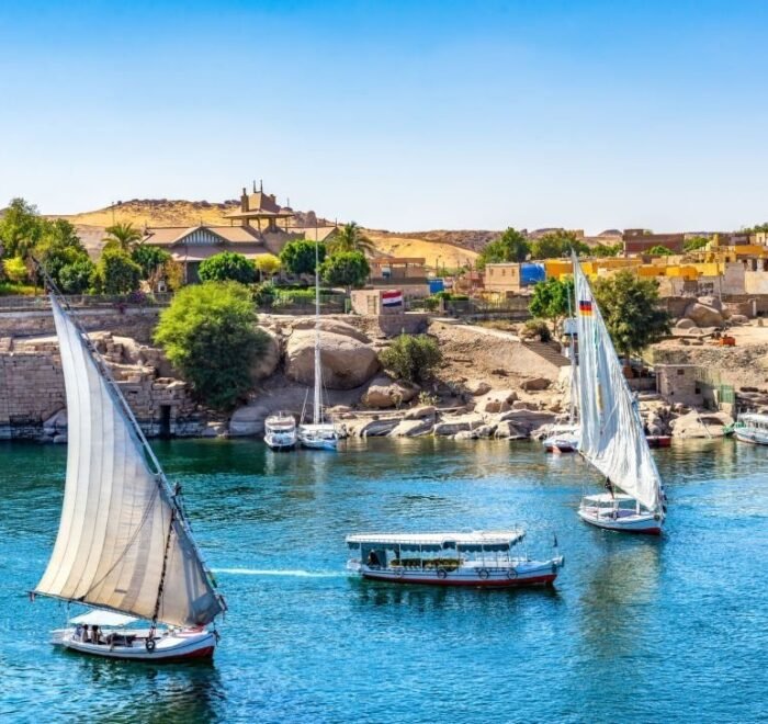 Sunlight over boats on Nile in Aswan, Egypt